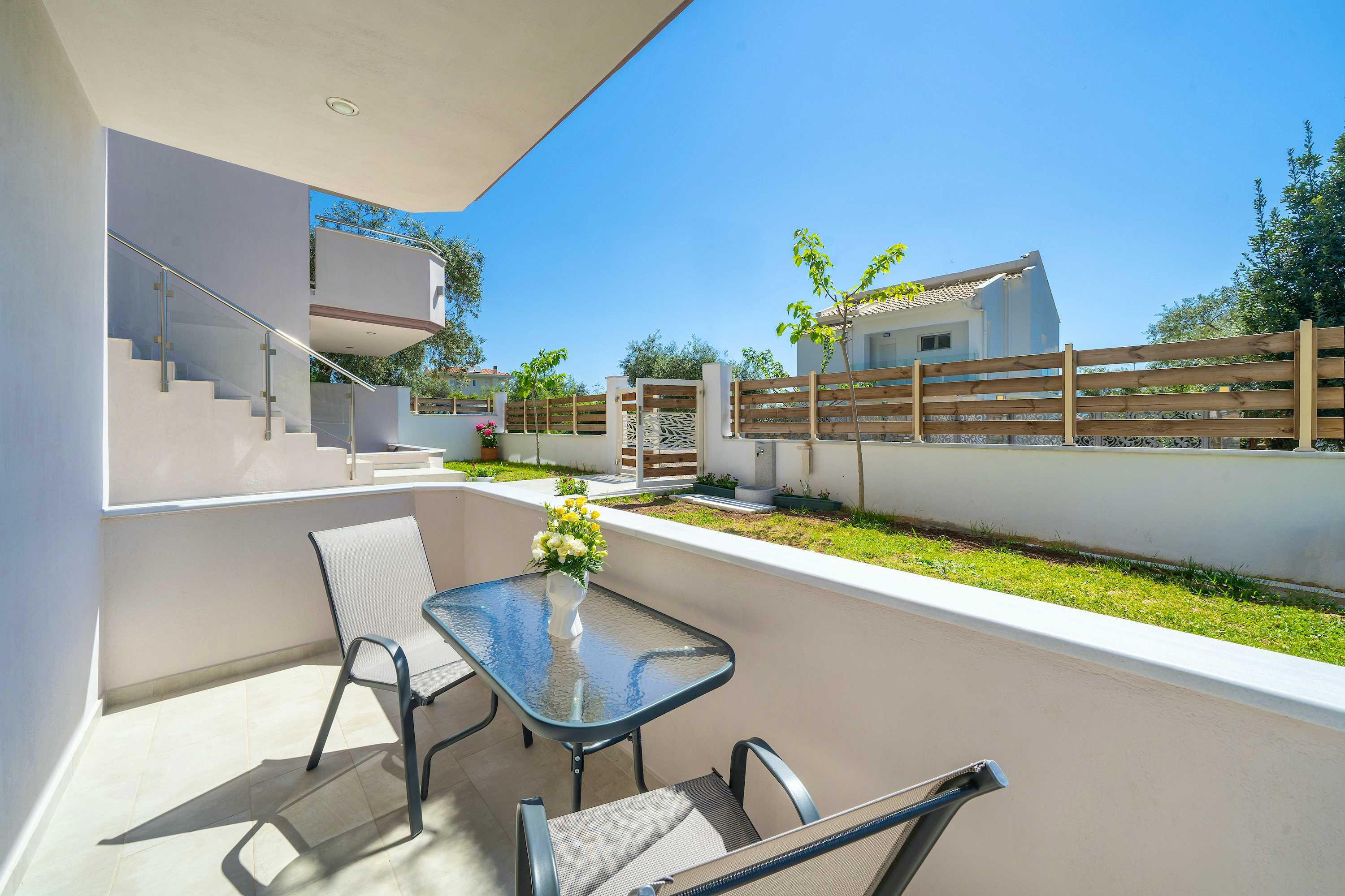 Photo Caption: Spacious Balcony Spend Time Outside Comfy seats ar