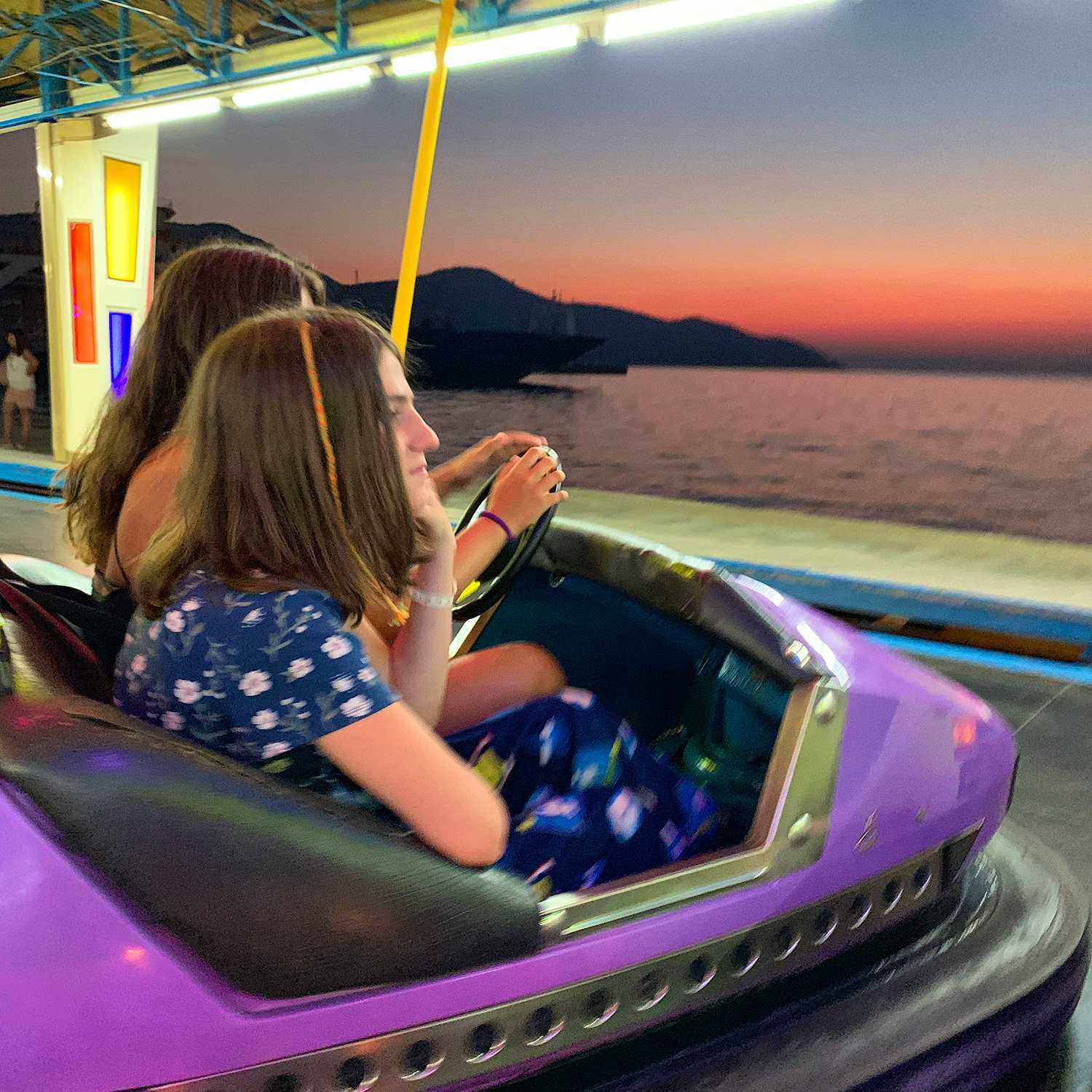 Photo Caption: Have fun after sunset with your kids at the Luna Park in Limenas