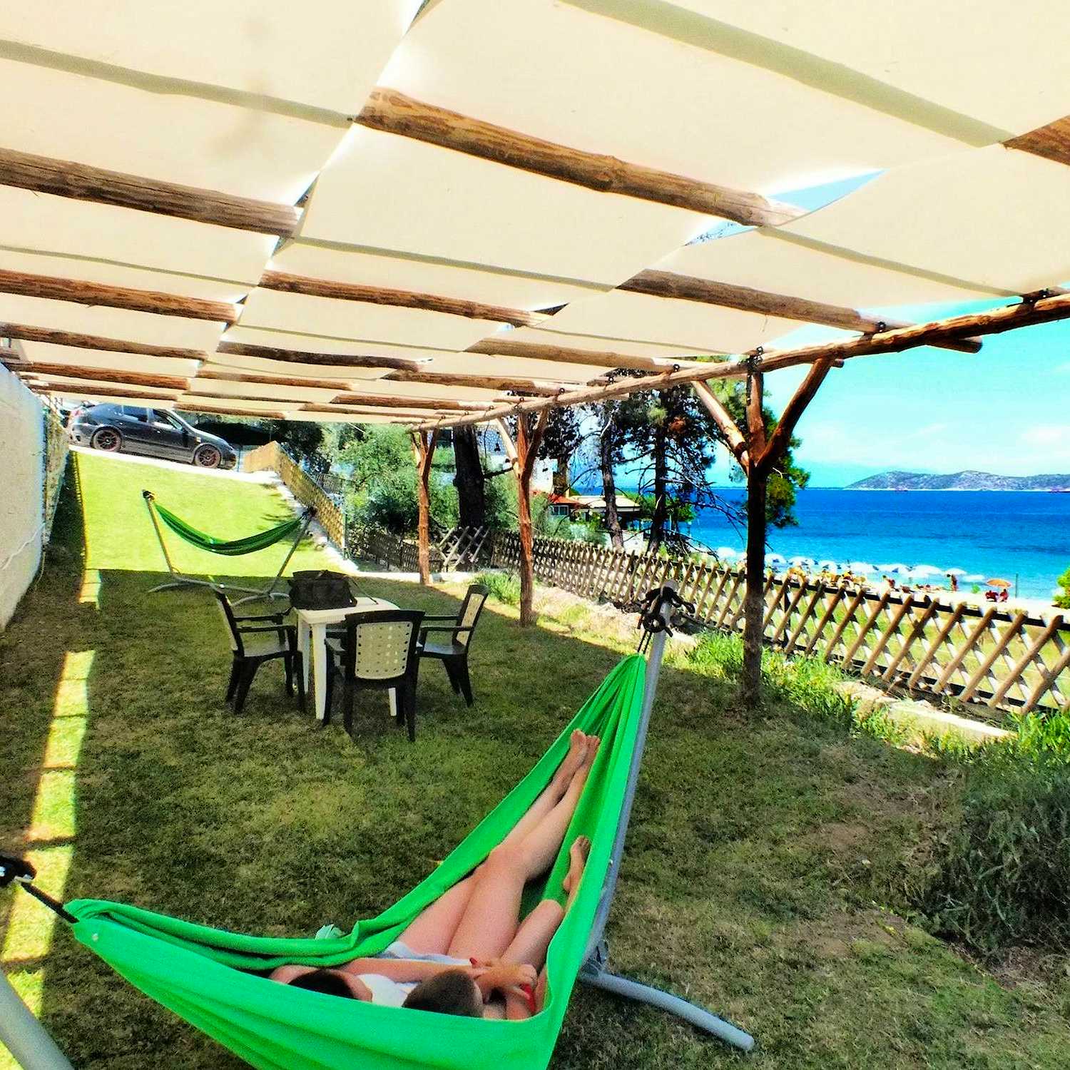 Photo Caption: Relax in the hammock with a sea breeze, read a book, or take a nap